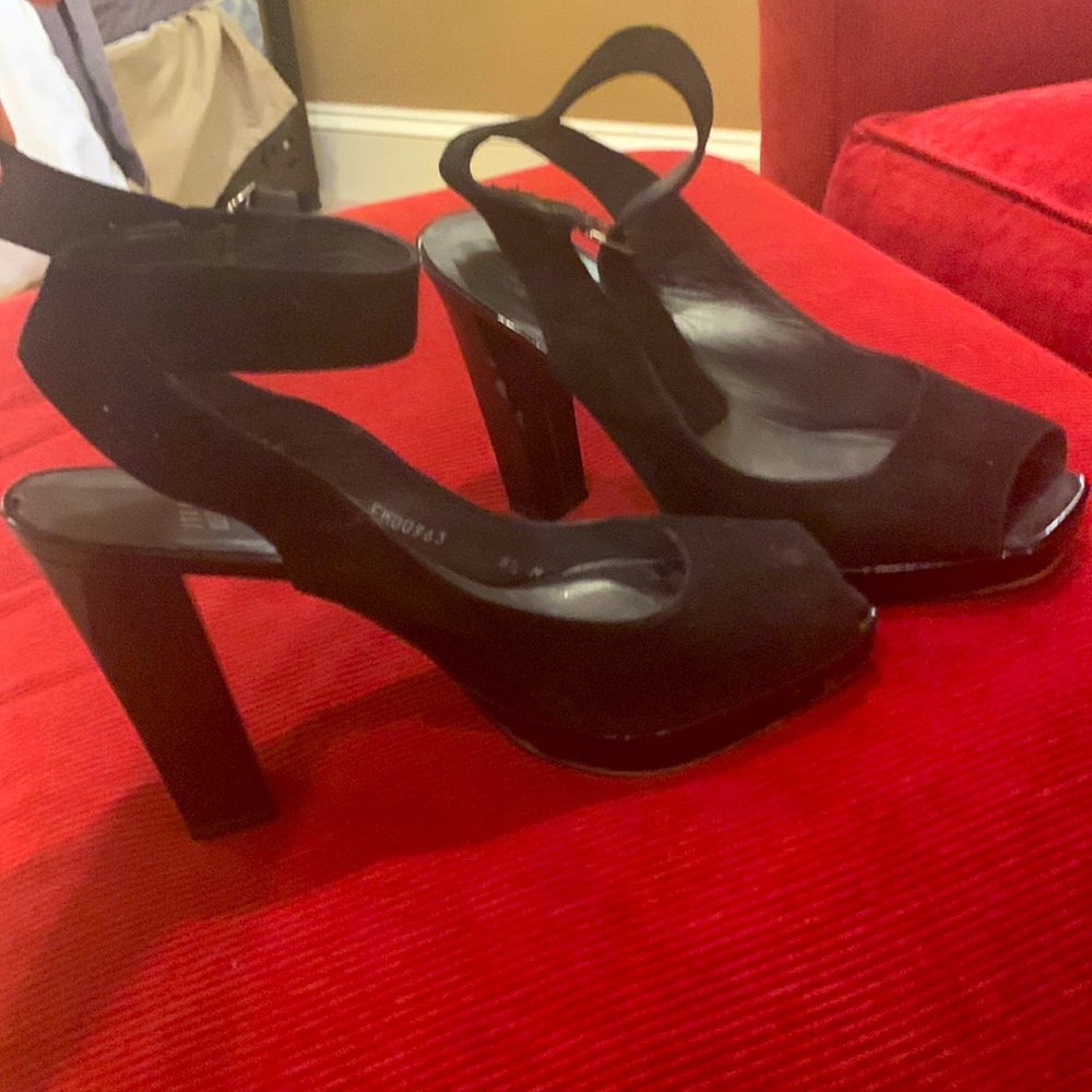 Stunning black suede heels with ankle strap. Perfect black heel for dressy event